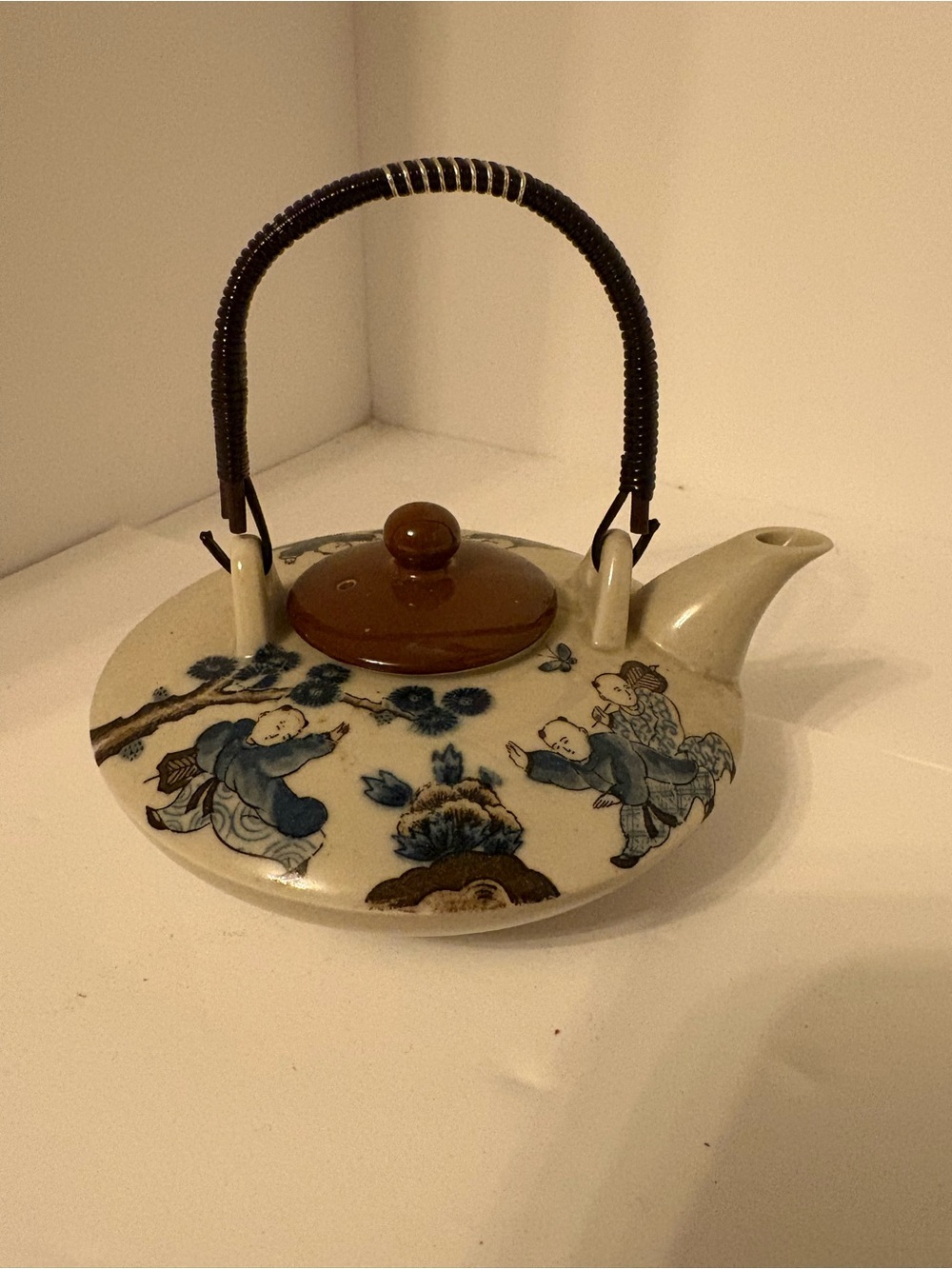 Vintage Blue and Brown Ceramic Decorative Teapot with Woven Handle